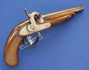 An antique probably Swiss Percussion Pistol with a very rare lock sytem, caliber 10 mm rifled, length 28 cm, adjustable rear-sight, in very good condition