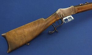 An antique Swiss Martini breechloading Rifle by J.U. Bänziger St. Gallen. Caliber 10,3 x 65 Bänziger. Rim and Centerfire. 75,5cm barrel. Set-triggers. Length 119cm. In very good condition. Price 695 Euro.