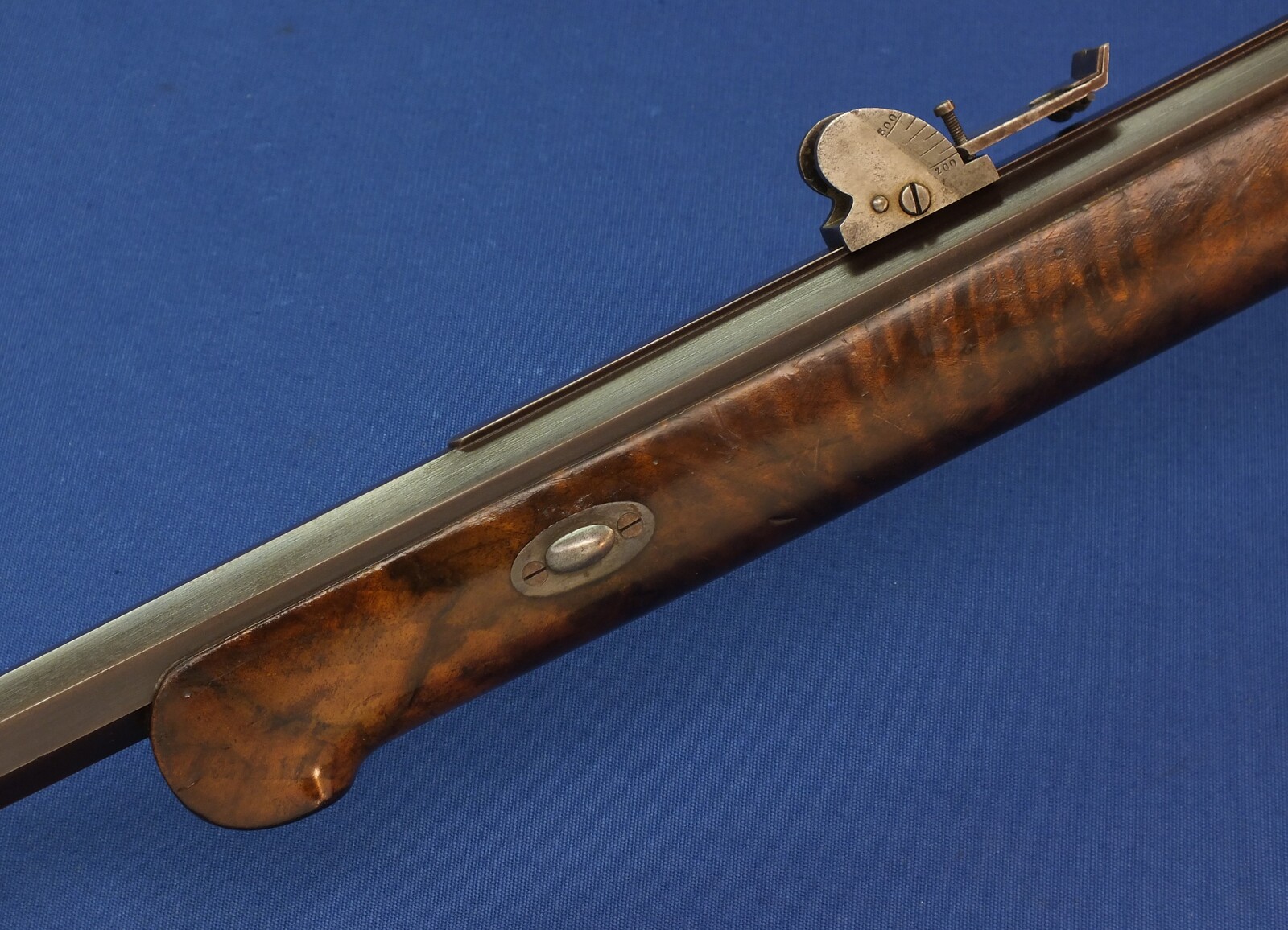 An antique Swiss Martini Breechloading Stutzer-Target Rifle by Rud. Elmer St. Gallen. Caliber 41 Swiss Rim and Centerfire. Set-triggers. 80cm octagon barrel. Length 128cm. In very good condition. 