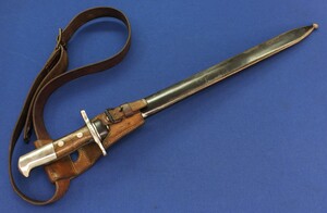 An Antique Swiss Model 1914 Pioneer Sawback Bayonet for Schmidt-Rubin model 1911 Carbine, K31. SN844216, Elsener Schwyz. With original leather frog and belt. Length 64cm. In very good Condition. Price 495 euro.