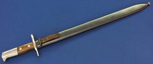 An Antique Swiss Model 1914 Pioneer Sawback Bayonet for Schmidt-Rubin model 1911 Carbine, K31. SN900683, Elsener Schwyz. Length 64cm. In near mint Condition. Price 450 euro.