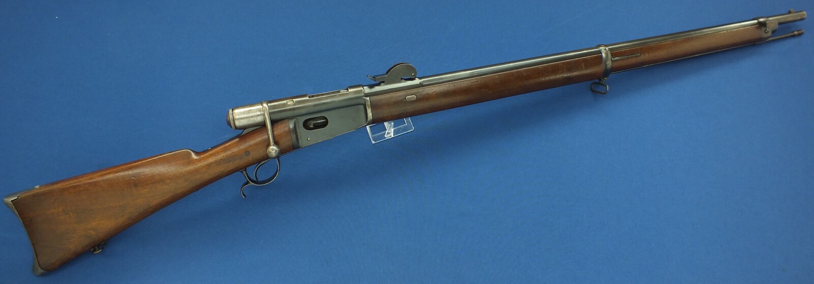 An antique Swiss Vetterli Rifle Model 1871/81. Caliber 10,4x38/Swiss .41 Rimfire. Length 132cm. In very good condition. Price 1.150 euro.