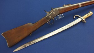 An antique US Remington Rolling Block Egyptian Model 1869 Rifle with Yatagan Bayonet. 35 inch barrel. Caliber 11.5mm. Length 128cm. In very good condition. 
