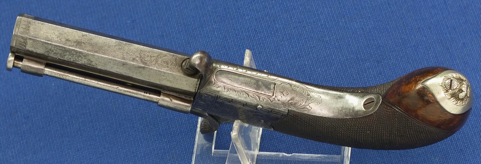 An English Percussion Wender pistol with thumbpiece safety catch by D.Mortimer London. Caliber 9,5mm. Length 19cm. In very good condition. Price 950 euro