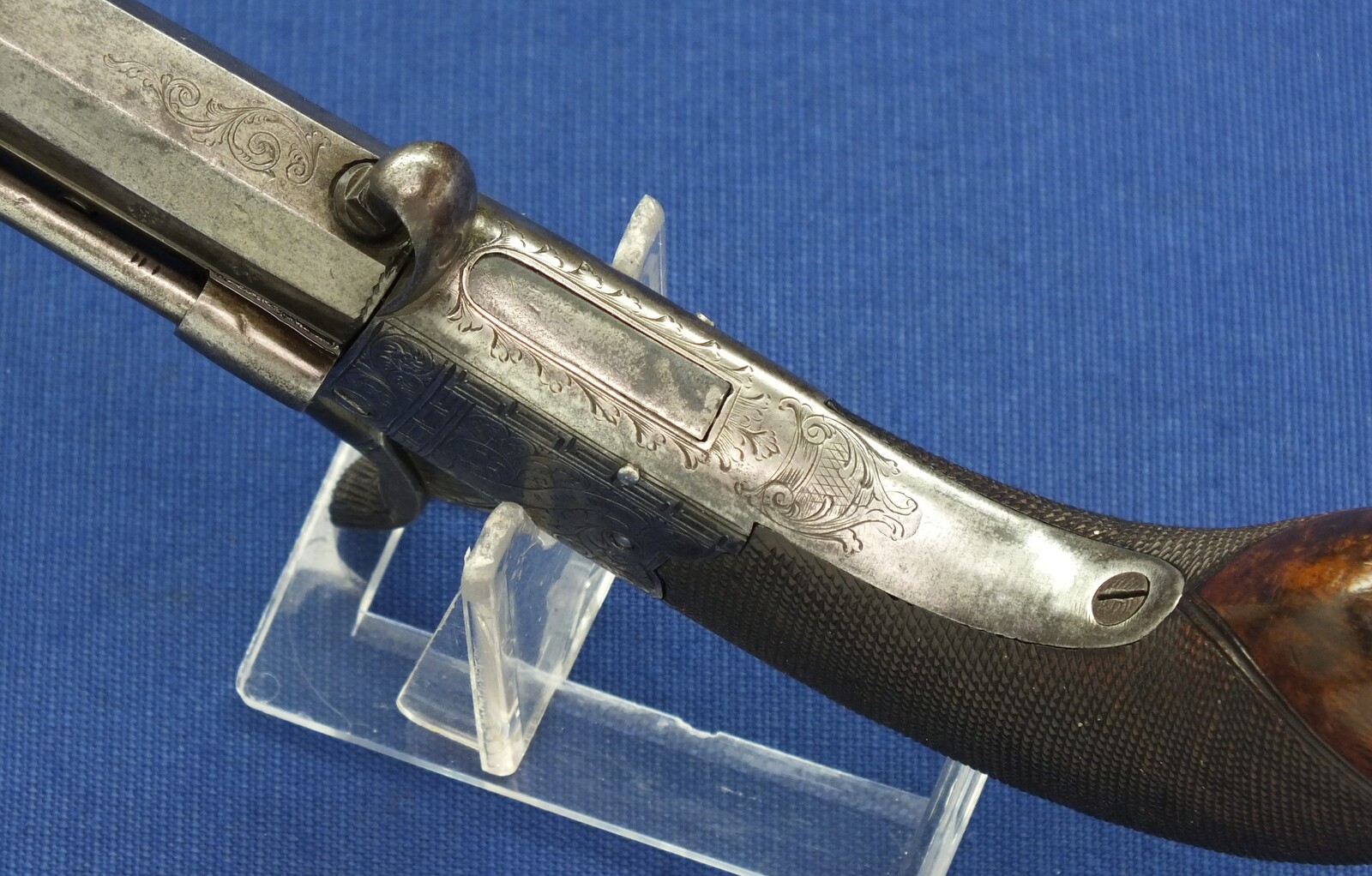 An English Percussion Wender pistol with thumbpiece safety catch by D.Mortimer London. Caliber 9,5mm. Length 19cm. In very good condition. Price 950 euro