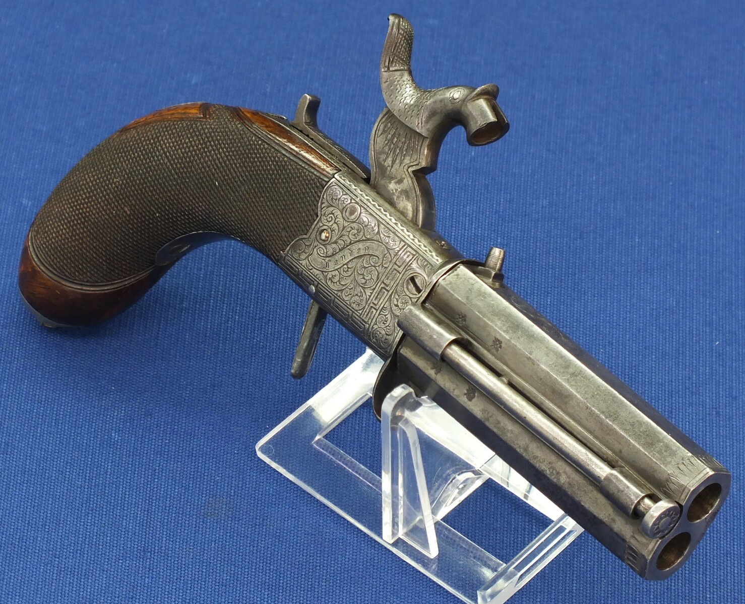 An English Percussion Wender pistol with thumbpiece safety catch by D.Mortimer London. Caliber 9,5mm. Length 19cm. In very good condition. Price 950 euro