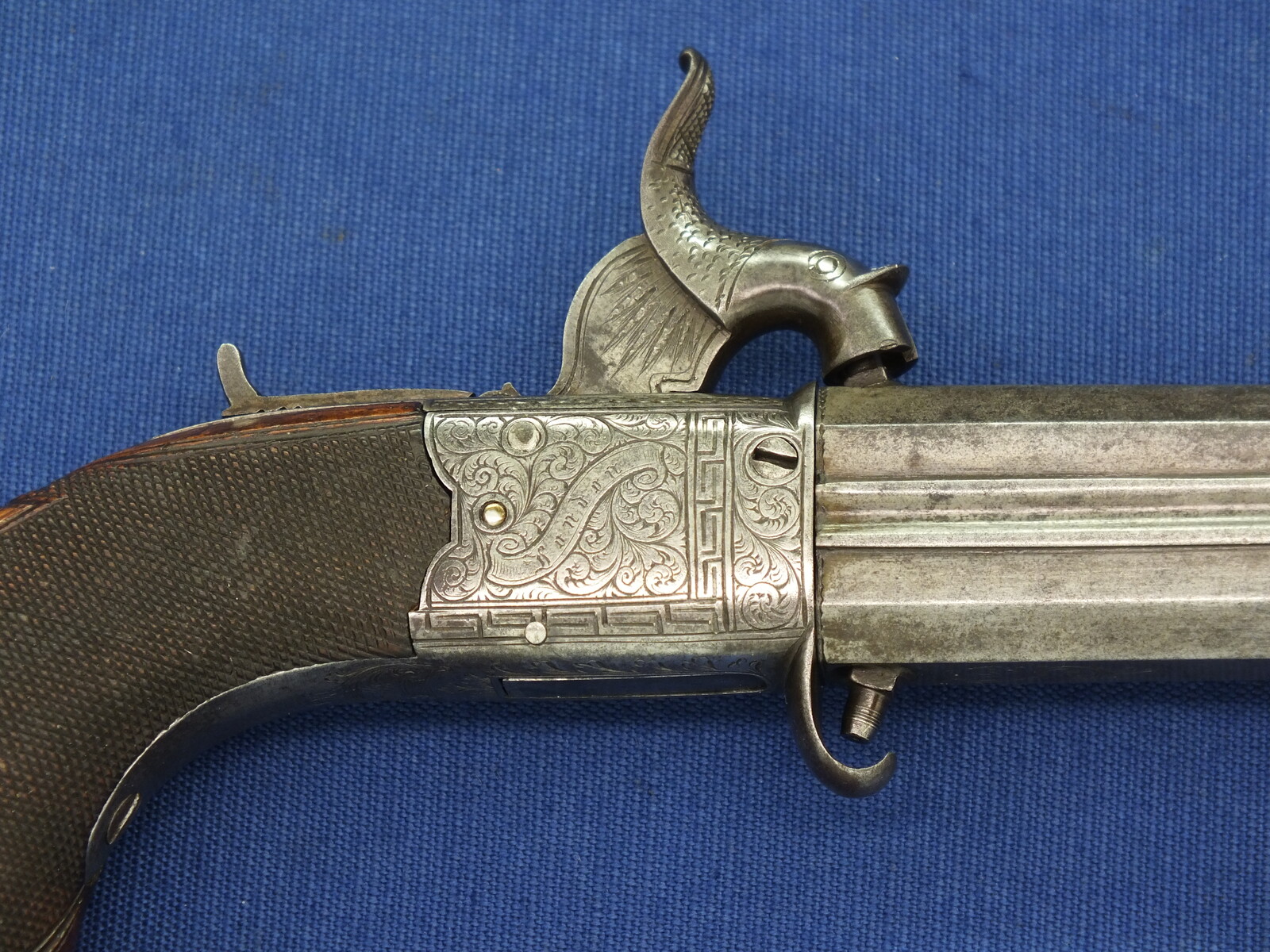 An English Percussion Wender pistol with thumbpiece safety catch by D.Mortimer London. Caliber 9,5mm. Length 19cm. In very good condition. Price 950 euro