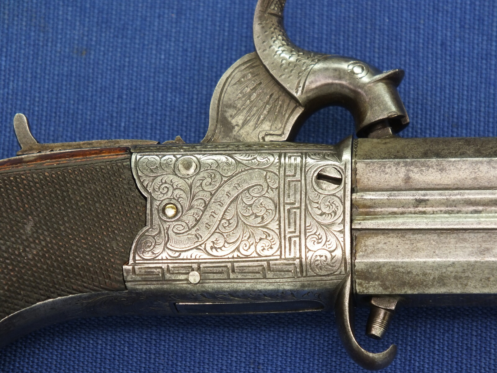 An English Percussion Wender pistol with thumbpiece safety catch by D.Mortimer London. Caliber 9,5mm. Length 19cm. In very good condition. Price 950 euro