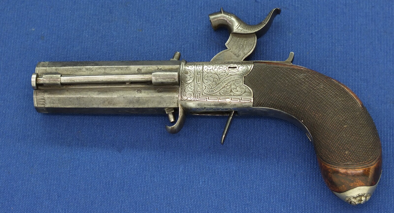 An English Percussion Wender pistol with thumbpiece safety catch by D.Mortimer London. Caliber 9,5mm. Length 19cm. In very good condition. Price 950 euro