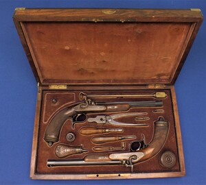 An excellent antique cased pair of Argentinian percussion pistols by L.Ambrosini Buenos Aires owned by Nicolas L. Vlahovich minister of Justice of first republic of La Boca. In near mint condition. Price on request