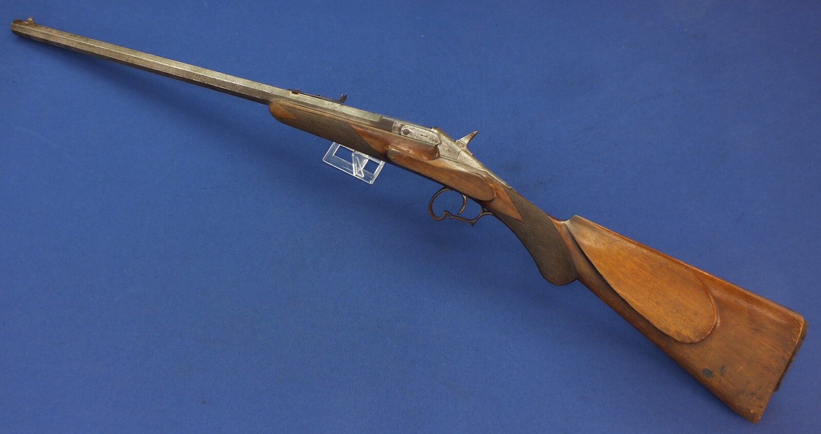 An unrestored Liege Flobert Rifle. Caliber 6mm. 62cm octagonal barrel, length 103cm. In good condition. 