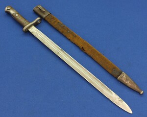 Antique unrestored Spanish Model 1913 Bayonet by Artilleria Fca Nacional Toledo, D55202. Rests of original Leather scabbard. Length 56cm. In fair/good condition. Price 70 euro