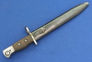 Rare British No5 MKI, Type II Jungle Carbine Bayonet by Poole 1946, for the No5, MKI Lee Enfield. Length 32cm. In very good condition. 